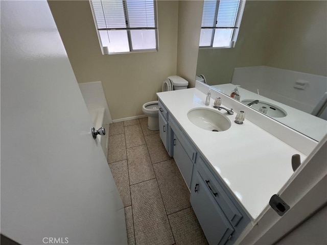 43216 San Miguel Way, Hemet, CA 92544 - full bathroom with vanity, a tub to relax in, and tile patterned flooring