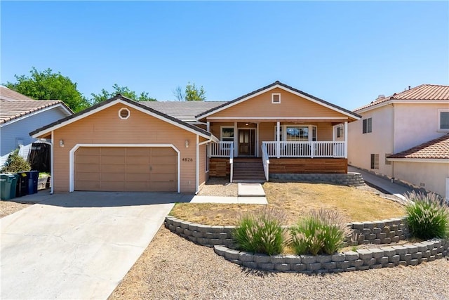 4826 Meadow Lark Ln, Paso Robles, CA 93446 - view of front of house featuring covered porch, a garage, and driveway