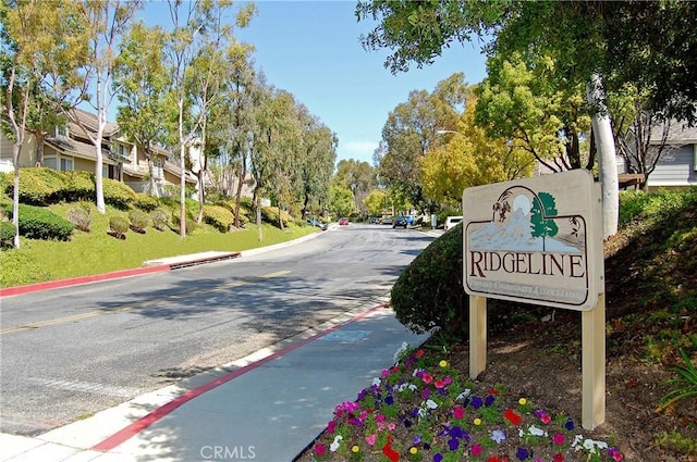 2614 S Quarry Ln Unit D, Walnut, CA 91789 - view of asphalt road featuring curbs and street lights