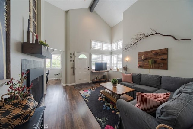 2614 S Quarry Ln Unit D, Walnut, CA 91789 - living area featuring beam ceiling, wood finished floors, high vaulted ceiling, and a fireplace