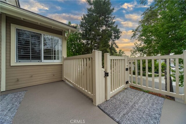 2614 S Quarry Ln Unit D, Walnut, CA 91789 - view of patio featuring a gate