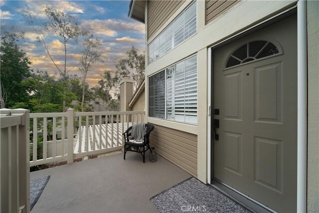 2614 S Quarry Ln Unit D, Walnut, CA 91789 - view of exterior entry at dusk
