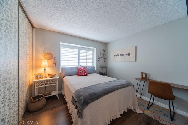 2614 S Quarry Ln Unit D, Walnut, CA 91789 - bedroom with wood finished floors and a textured ceiling