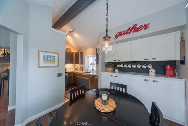 2614 S Quarry Ln Unit D, Walnut, CA 91789 - dining space featuring dark wood-style floors and baseboards