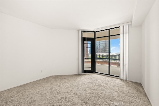 500 W Harbor Dr Unit 808, San Diego, CA 92101 - carpeted spare room with floor to ceiling windows and baseboards