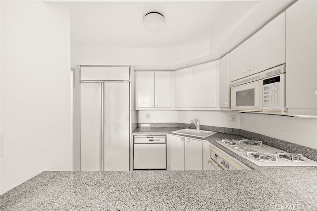 500 W Harbor Dr Unit 808, San Diego, CA 92101 - kitchen featuring white appliances and white cabinets