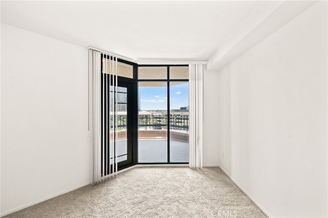 500 W Harbor Dr Unit 808, San Diego, CA 92101 - carpeted spare room featuring expansive windows and baseboards