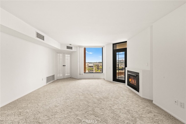 500 W Harbor Dr Unit 808, San Diego, CA 92101 - unfurnished living room with carpet and a glass covered fireplace