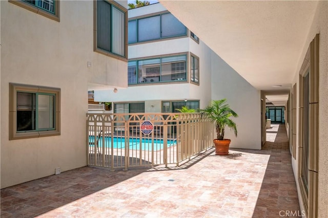 201 Calle Miramar Unit 8, Redondo Beach, CA 90277 - view of patio with a community pool