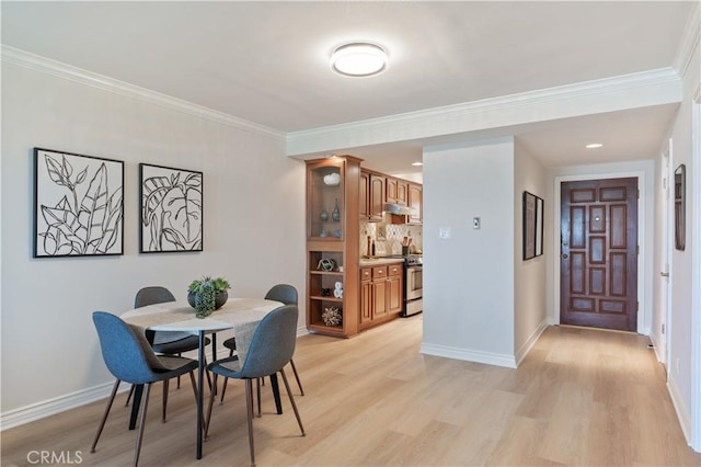 201 Calle Miramar Unit 8, Redondo Beach, CA 90277 - dining room featuring light wood-style flooring and crown molding