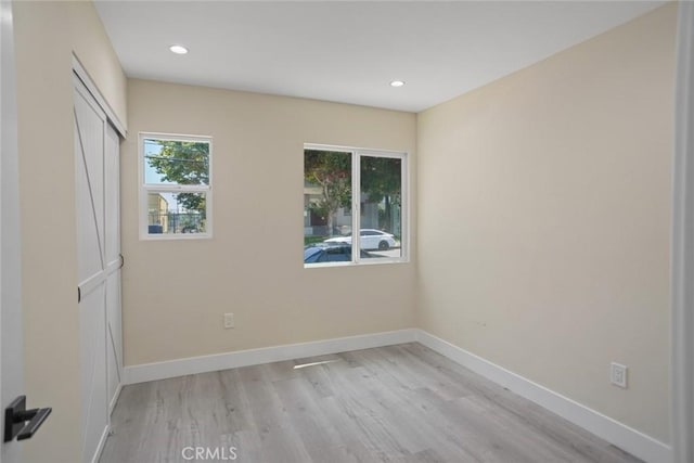 3123 Hyde Park Blvd, Los Angeles, CA 90043 - empty room with light wood-type flooring and recessed lighting