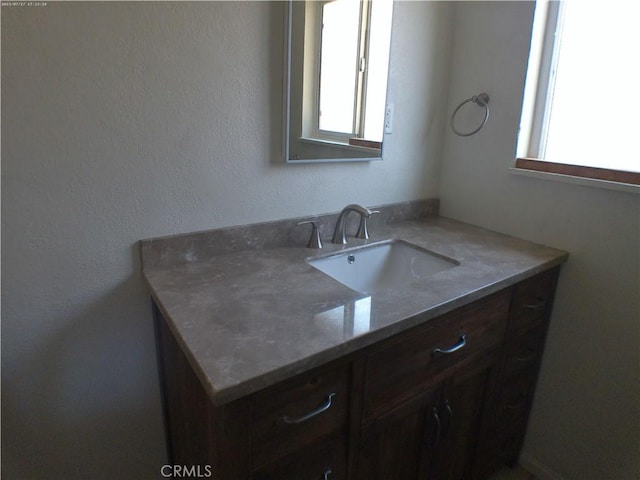 9831 Tangelo Ave, Bloomington, CA 92316 - bathroom with healthy amount of natural light and vanity