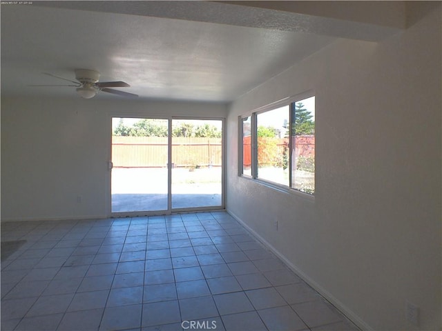 9831 Tangelo Ave, Bloomington, CA 92316 - unfurnished room featuring a ceiling fan and light tile patterned flooring
