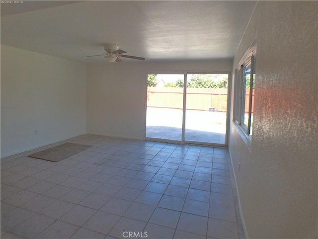 9831 Tangelo Ave, Bloomington, CA 92316 - spare room featuring ceiling fan and light tile patterned floors