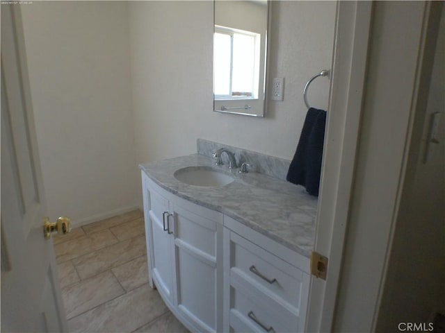 9831 Tangelo Ave, Bloomington, CA 92316 - bathroom featuring vanity and baseboards