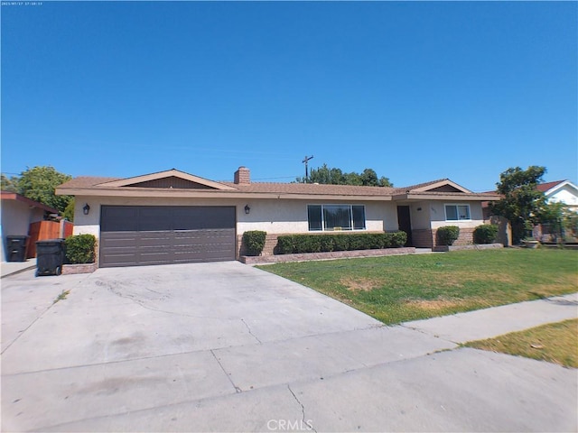 9831 Tangelo Ave, Bloomington, CA 92316 - ranch-style house with stucco siding, an attached garage, a front yard, driveway, and a chimney