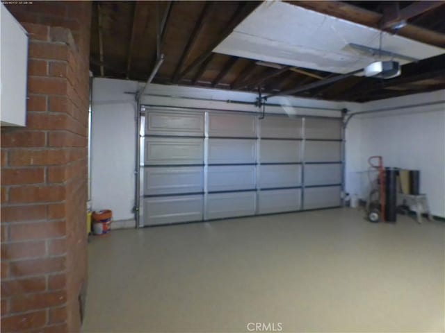 9831 Tangelo Ave, Bloomington, CA 92316 - garage featuring a garage door opener