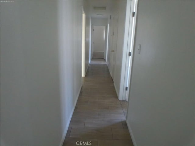 9831 Tangelo Ave, Bloomington, CA 92316 - corridor featuring baseboards