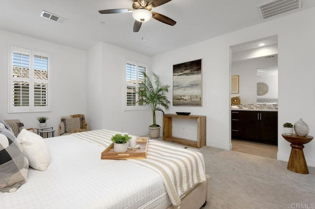 3141 Dega Pl, Carlsbad, CA 92010 - bedroom with multiple windows, light carpet, and connected bathroom