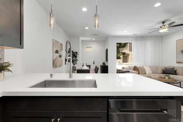 3141 Dega Pl, Carlsbad, CA 92010 - kitchen featuring open floor plan, light countertops, recessed lighting, stainless steel dishwasher, and a ceiling fan