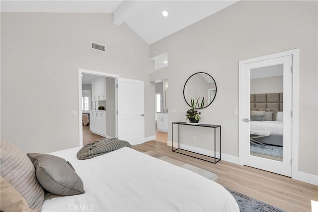 21212 Valleyview Dr, Walnut, CA 91789 - bedroom with light wood-type flooring, beam ceiling, high vaulted ceiling, and connected bathroom