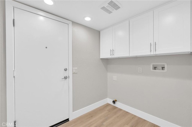 21212 Valleyview Dr, Walnut, CA 91789 - laundry room with cabinet space, light wood-style floors, hookup for a washing machine, and recessed lighting