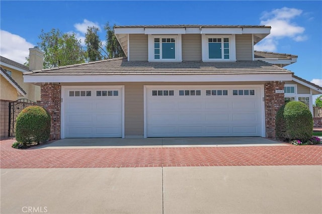 21212 Valleyview Dr, Walnut, CA 91789 - traditional home featuring decorative driveway and a garage