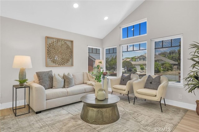 21212 Valleyview Dr, Walnut, CA 91789 - living area featuring light wood-style flooring, high vaulted ceiling, and recessed lighting