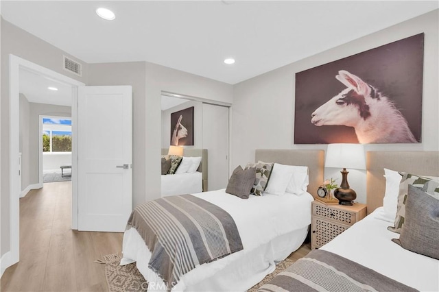 21212 Valleyview Dr, Walnut, CA 91789 - bedroom with light wood-style floors, a closet, and recessed lighting