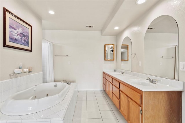 8379 Beaver Ave, Phelan, CA 92371 - full bath with a whirlpool tub, double vanity, recessed lighting, and tile patterned flooring