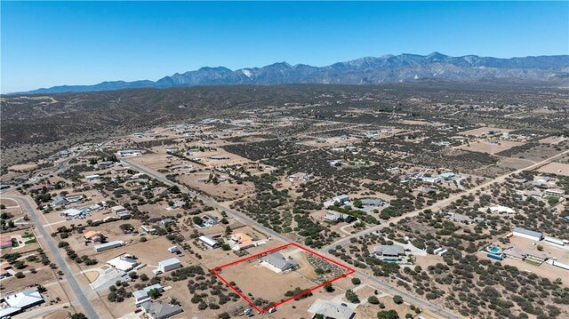 8379 Beaver Ave, Phelan, CA 92371 - aerial view of property and surrounding area with property parcel outlined and a mountainous background
