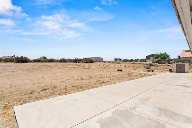 8379 Beaver Ave, Phelan, CA 92371 - view of yard featuring a patio and a rural view
