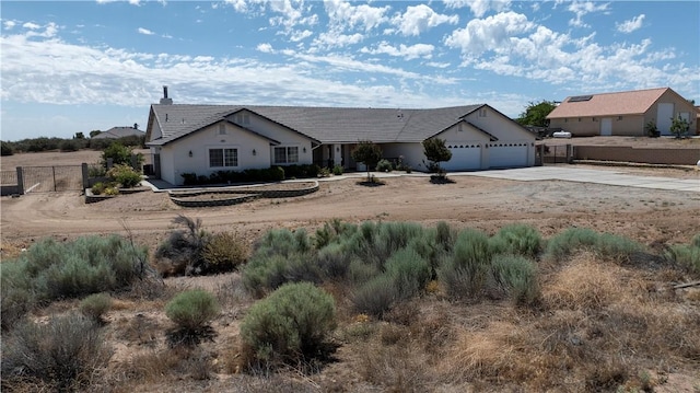 8379 Beaver Ave, Phelan, CA 92371 - single story home featuring concrete driveway and a garage