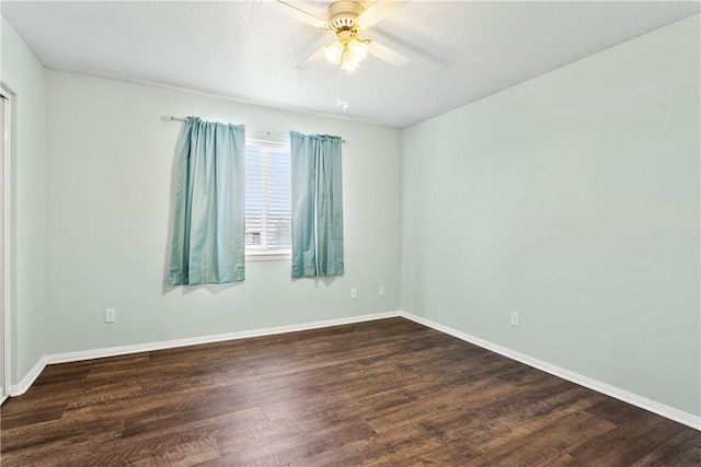 8379 Beaver Ave, Phelan, CA 92371 - unfurnished room featuring ceiling fan and dark wood-type flooring