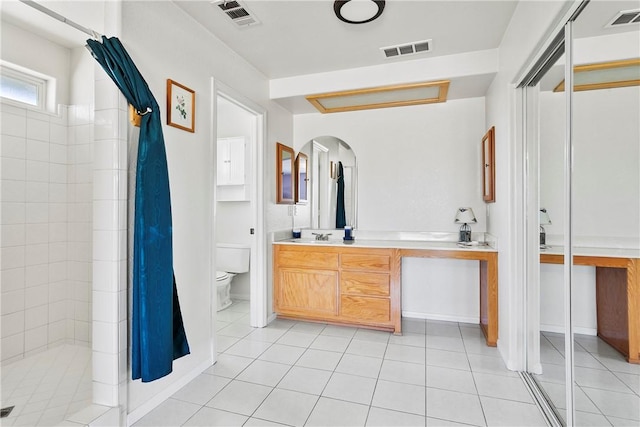 8379 Beaver Ave, Phelan, CA 92371 - full bath with tiled shower, tile patterned floors, and double vanity