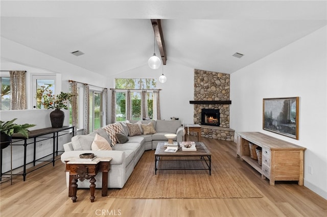 42333 Casa Verde, Temecula, CA 92592 - living area with light wood-type flooring, healthy amount of natural light, and a stone fireplace