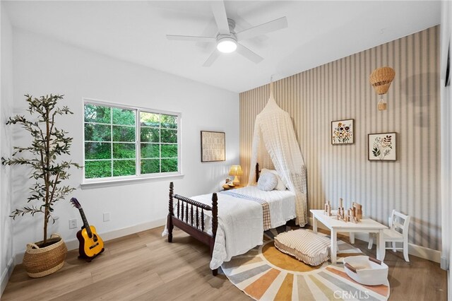 42333 Casa Verde, Temecula, CA 92592 - bedroom with light wood-style flooring and a ceiling fan