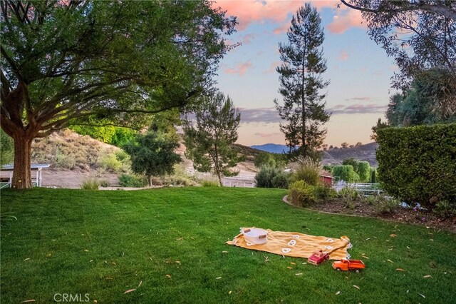 42333 Casa Verde, Temecula, CA 92592 - yard at dusk with a lawn and a mountain view