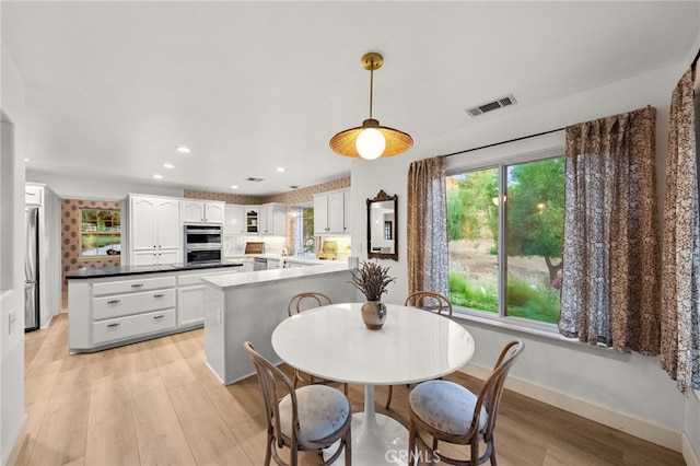 42333 Casa Verde, Temecula, CA 92592 - dining space with light wood-style flooring, healthy amount of natural light, and recessed lighting