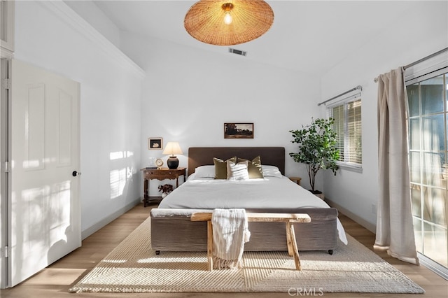 42333 Casa Verde, Temecula, CA 92592 - bedroom featuring vaulted ceiling, light wood finished floors, and access to exterior