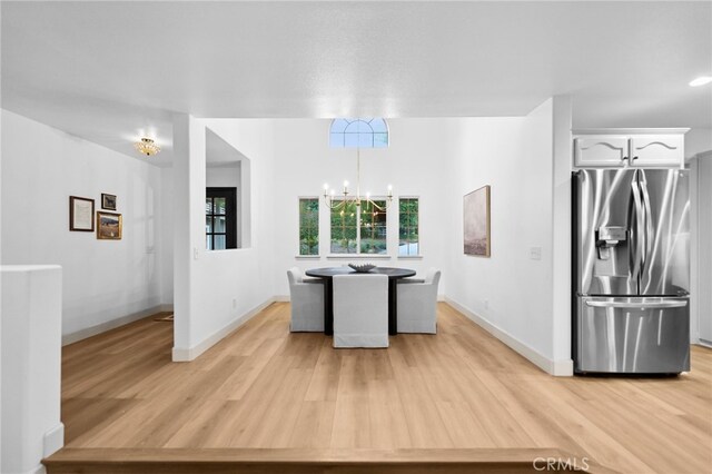 42333 Casa Verde, Temecula, CA 92592 - unfurnished dining area featuring a chandelier and light wood-style floors