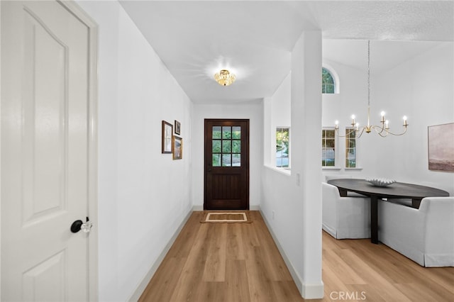 42333 Casa Verde, Temecula, CA 92592 - entrance foyer with light wood-style flooring and a chandelier