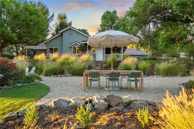 42333 Casa Verde, Temecula, CA 92592 - back of house at dusk featuring stucco siding and a patio