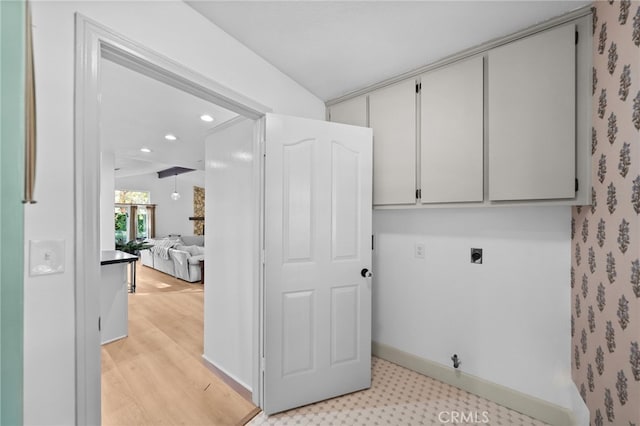 42333 Casa Verde, Temecula, CA 92592 - washroom with cabinet space, electric dryer hookup, recessed lighting, and light wood-type flooring
