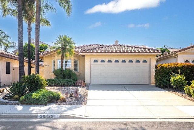 28328 Via Bandita, Menifee, CA 92585 - mediterranean / spanish house with stucco siding, driveway, a tile roof, and a garage