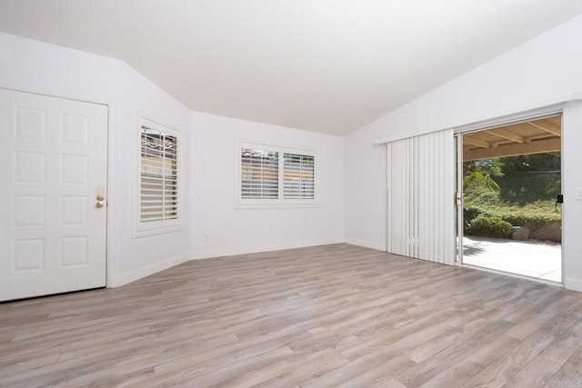 28328 Via Bandita, Menifee, CA 92585 - spare room featuring vaulted ceiling and light wood-type flooring