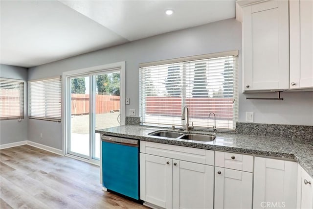 3810 Adams St, Lake Elsinore, CA 92530 - kitchen with dishwashing machine, light wood-type flooring, white cabinetry, stone countertops, and recessed lighting