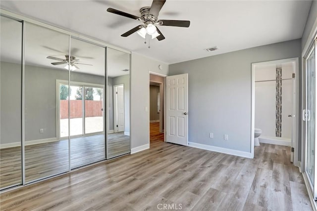 3810 Adams St, Lake Elsinore, CA 92530 - unfurnished bedroom with wood finished floors, ensuite bath, and ceiling fan