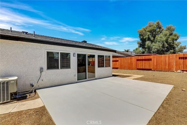 3810 Adams St, Lake Elsinore, CA 92530 - rear view of house with a fenced backyard, stucco siding, and a patio