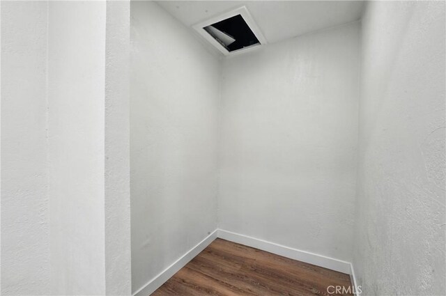 14581460 W 80th St, Los Angeles, CA 90047 - spare room with dark wood finished floors and baseboards